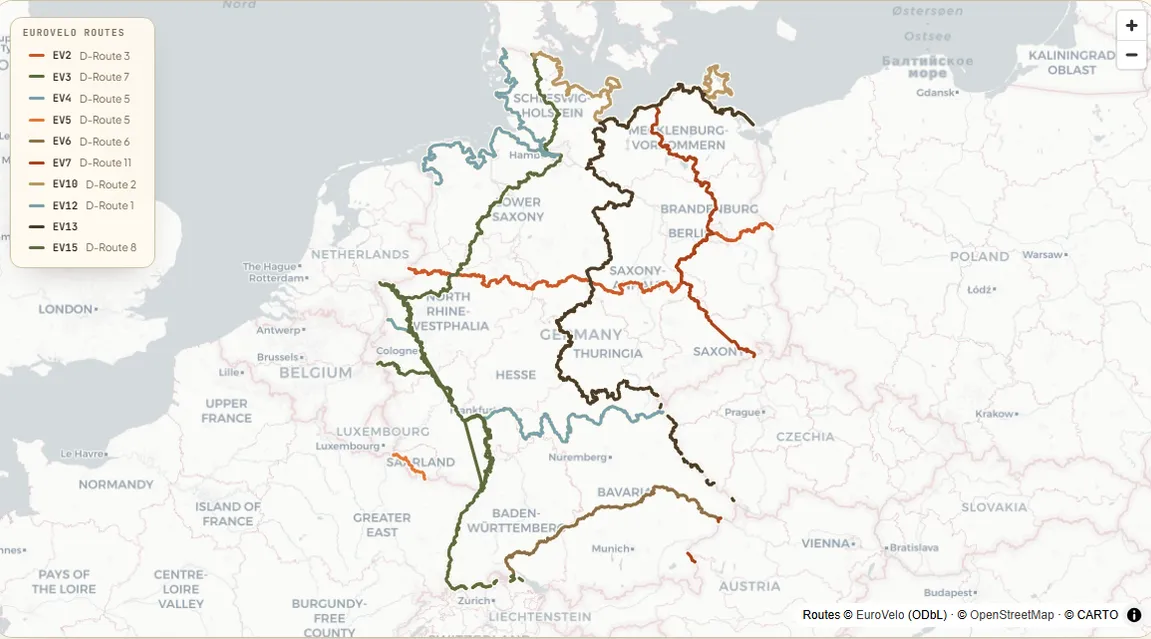 Map of Germany with ten signed EuroVelo routes — the Rhine Cycle Route (EV15) and the Rhine–Main run (EV4) down the west, the Danube (EV6) to Passau in the south-east, the Capitals (EV2) and Pilgrims (EV3) routes across the country, the Baltic (EV10) and North Sea (EV12) coasts along the top, the Sun Route (EV7) through Berlin, and the Iron Curtain Trail (EV13) down the former inner-German border.