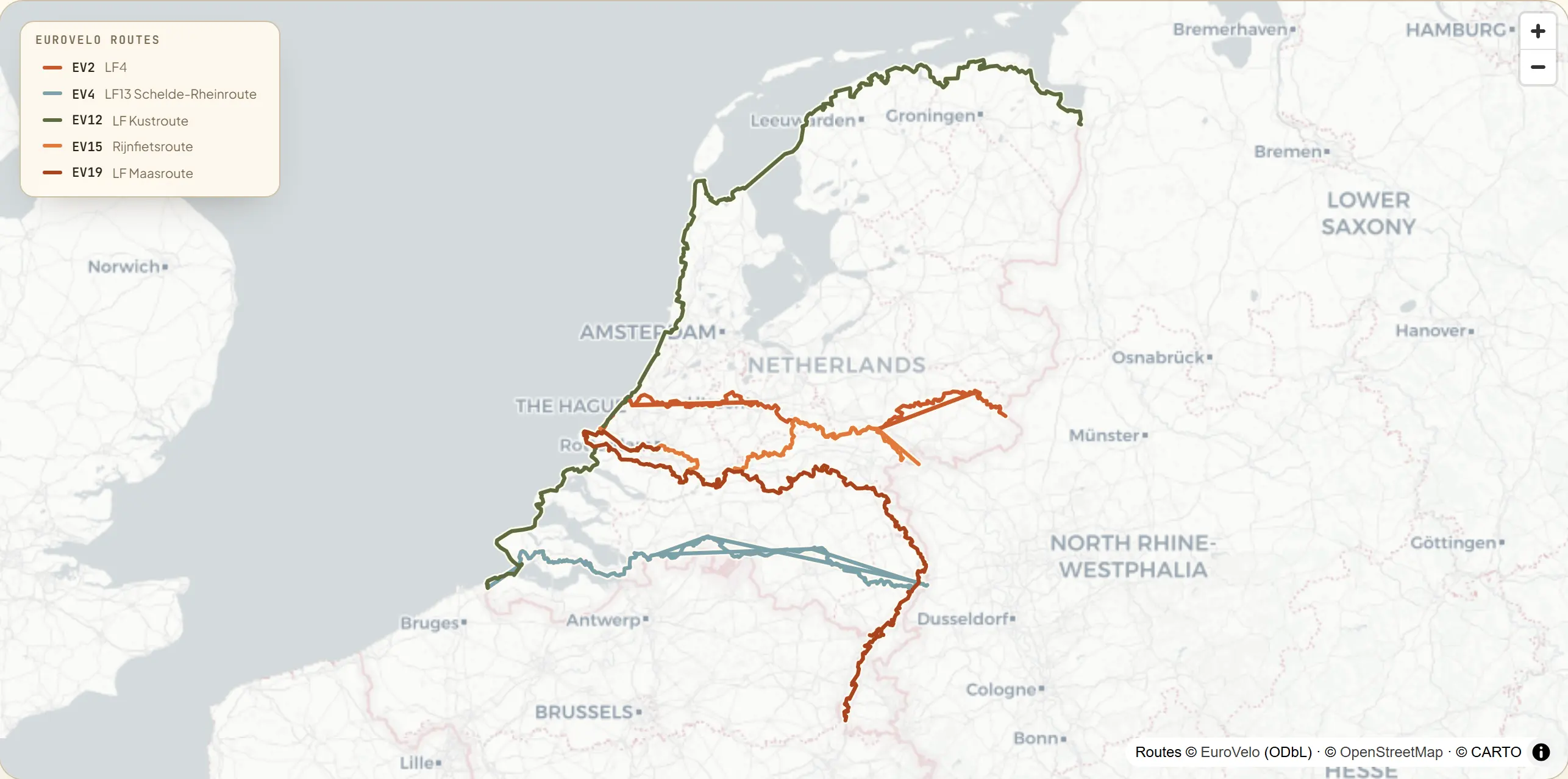 Map of the Netherlands with five signed EuroVelo routes — the North Sea Coastal Route (EV12) hugging the whole western coast, the Rhine Cycle Route (EV15) and the Meuse Cycle Route (EV19) converging on the Rotterdam delta, the Capitals Route (EV2) running east to Den Haag, and the Central Europe Route (EV4) across the southern provinces to Vlissingen.
