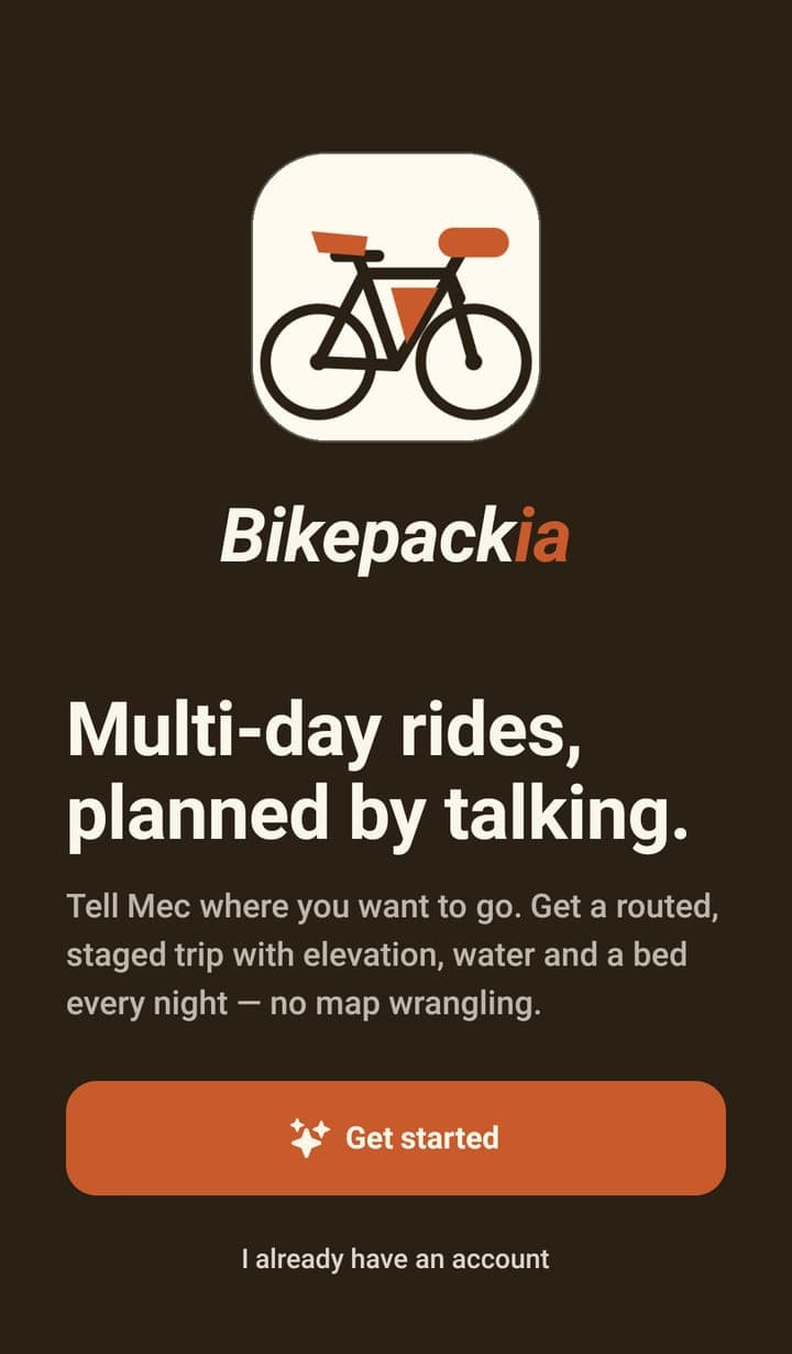 The app's welcome screen: the Bikepackia logo on dark brown, the headline 'Multi-day rides, planned by talking.', an orange 'Get started' button and an 'I already have an account' link.