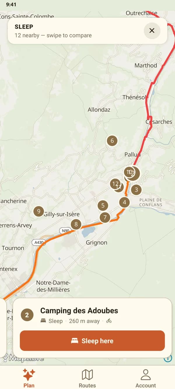 Twelve places to sleep pinned along the route near Albertville, with a card for Camping des Adoubes, 260 m from the route, and a Sleep here button.